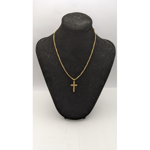 90 - A 9ct gold cross pendant on a 9ct gold box link necklace, total weight 9.4g
Location: CAB3