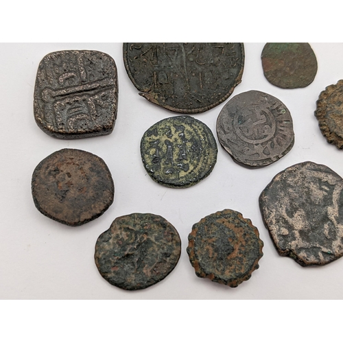 477 - A mixed collection of bronze and copper coins to include Rome / Byzantine examples, later Indian Sul... 