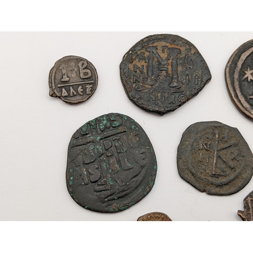 479 - Byzantine Empire - Mixed copper and bronze coinage to include NIKO 40 Nummi, Follis, Half Follis and... 