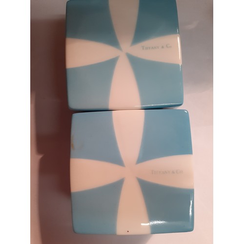 26 - Tiffany-2 turquoise ceramic boxes with white bow detail together with a Crummles enamelled pin cushi... 