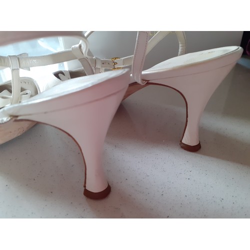 45 - Gina-A pair of white shoes with kitten heels and three bow design, UK size 4½ with original branded ... 