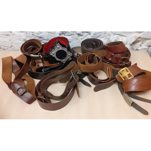 88 - A quantity of vintage leather belts A/F to include military and USSR examples. Location:1.4