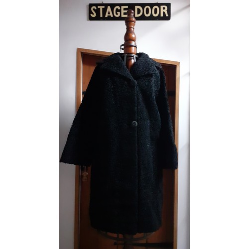 85 - Two mid 20th Century ladies coats comprising a mid 20th Century navy woollen St Andrew's Ambulance S... 