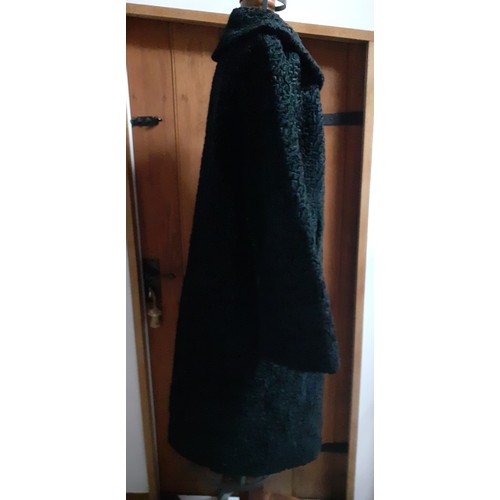 85 - Two mid 20th Century ladies coats comprising a mid 20th Century navy woollen St Andrew's Ambulance S... 