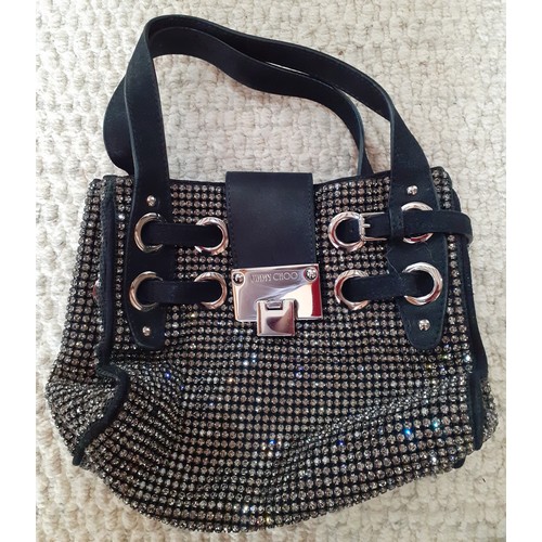 13 - Jimmy Choo-A Ramona tote bag encased with grey crystals on a black ground with silver tone hardware ... 