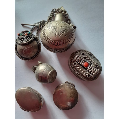 94 - A quantity of silver and white metal items to include miniature silver boxes, a silver bangle in the... 