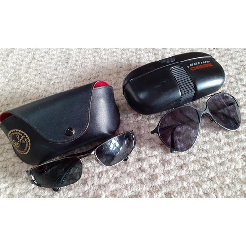 93 - Two pairs of vintage sunglasses comprising a pair of 1980's Boeing Carrera matt black framed sunglas... 