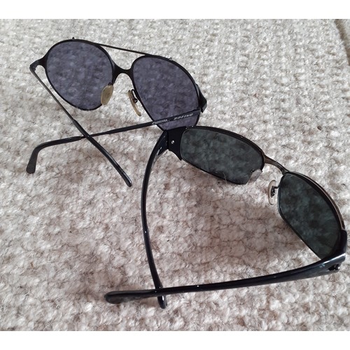 93 - Two pairs of vintage sunglasses comprising a pair of 1980's Boeing Carrera matt black framed sunglas... 