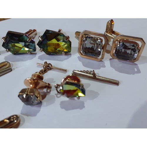 96 - A group of late 20th Century gold tone cufflinks, a pair of Mexican silver and green stone cufflinks... 