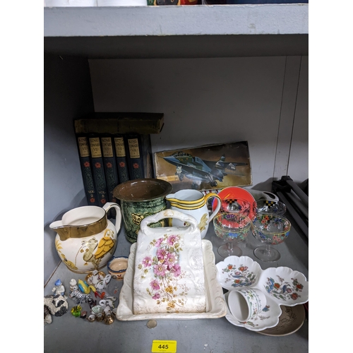 166 - A mixed lot to include studio pottery jugs, a Victorian cheese dish, Irish Wade pixies, four enamell... 