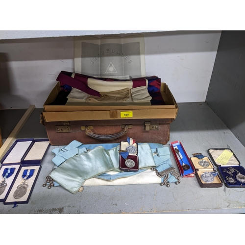 187 - **THIS LOT HAS BEEN WITHDRAWN**
A leather case containing Masonic aprons, and various medals to incl... 