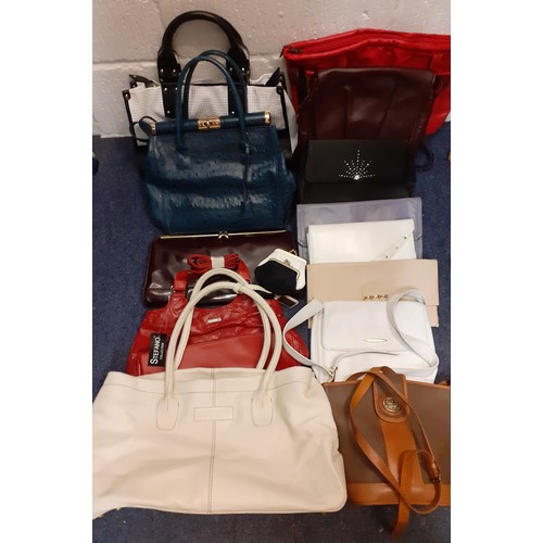 100 - A quantity of vintage bags to include a Pelle di Giada blue ostrich handbag having gold tone hardwar... 