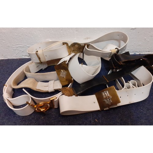 109 - A quantity of white drummer belts to include a Hobson's Uniform Specialists belt with gold tone buck... 