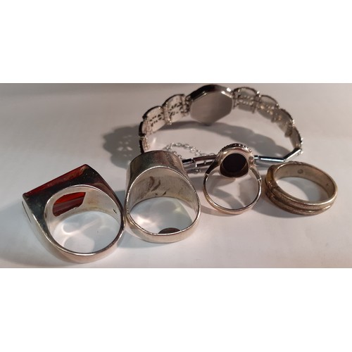 115 - Four silver rings to include 2 Contemporary examples and a Wedgwood black Jasperware ring together w... 