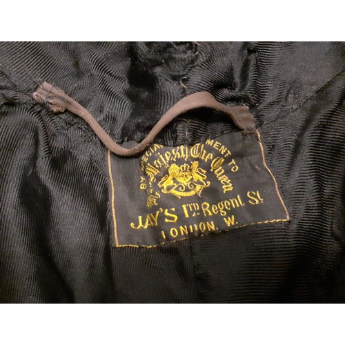 117 - A Victorian Jays Ltd of London black velvet mourning cape A/F having a black ostrich feather trim wi... 