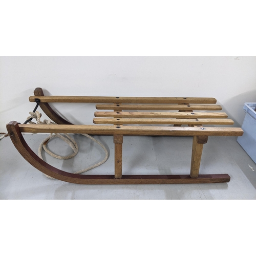 125 - A vintage bentwood Scandinavian sledge with rope Location:A1F