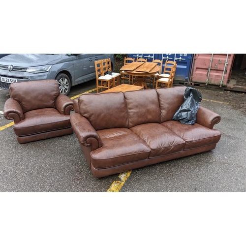 130 - A modern brown leather three seater sofa and armchair
Location: CONR