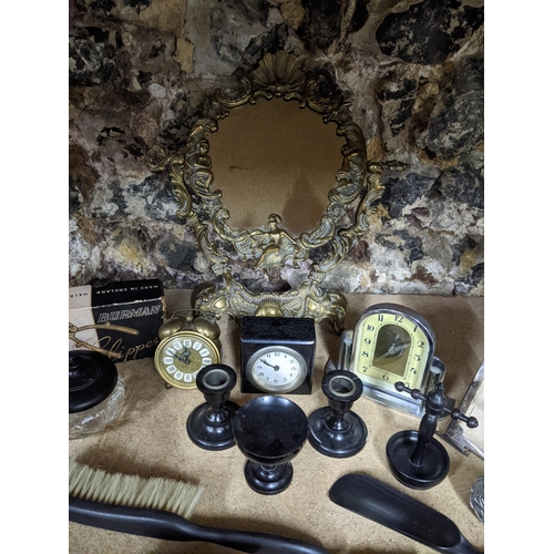 184 - A mixed lot to include two silver strict photograph frames and one other dressing table brush sets, ... 