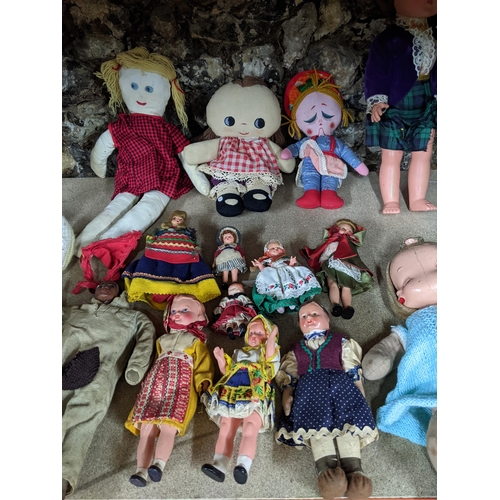 279 - A group of 1960s and later dolls to include a 1968 Ideal Toys Corp Crissy doll wearing period clothe... 