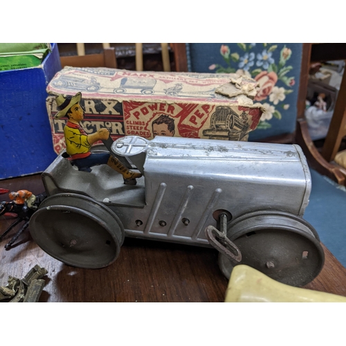 280 - A group of toys, and other items to include a vintage Escalado games, a Louis Marx Corp. tin plate c... 