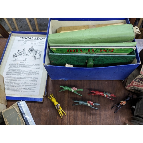 280 - A group of toys, and other items to include a vintage Escalado games, a Louis Marx Corp. tin plate c... 