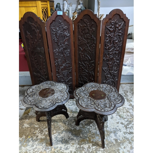 291 - A pair of brass inlaid hardwood tables carved with leaves of folding stands and a hardwood table top... 