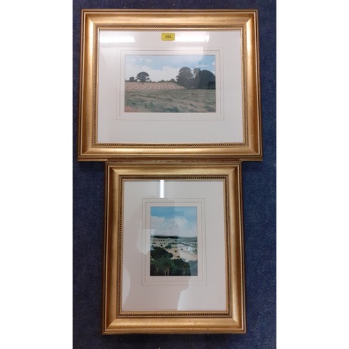 128 - Two embroidered pictures 25x16cm and 12x17cm of farmland country scenes using various stitching tech... 