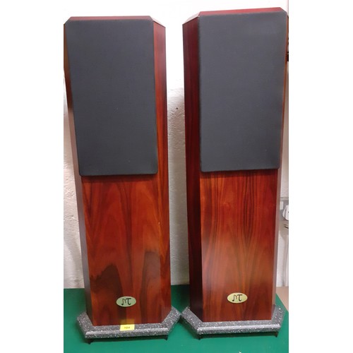 198 - A pair of MT speakers having a rosewood veneer case on a marble effect base above 3 metal feet, 33