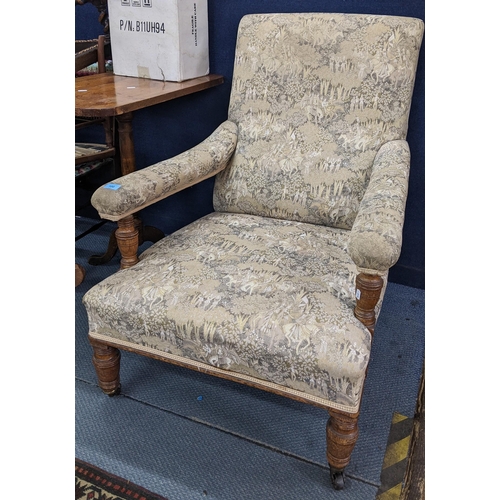 100 - A late Victorian John Reid & Sons deep oak armchair on turned front legs and signed casters
Location... 