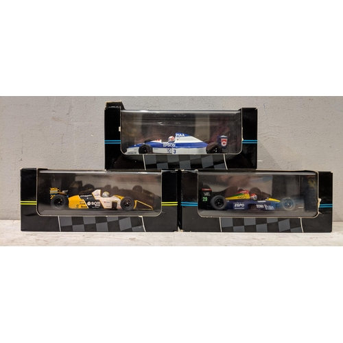 132 - A collection of 14 Onyx model F1 190 cars to include elf mobil and others, Williams FW15 limited edi... 