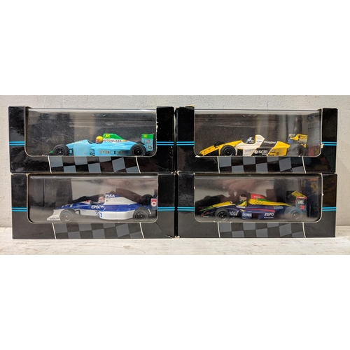 132 - A collection of 14 Onyx model F1 190 cars to include elf mobil and others, Williams FW15 limited edi... 