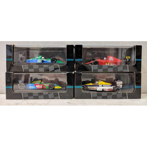 132 - A collection of 14 Onyx model F1 190 cars to include elf mobil and others, Williams FW15 limited edi... 