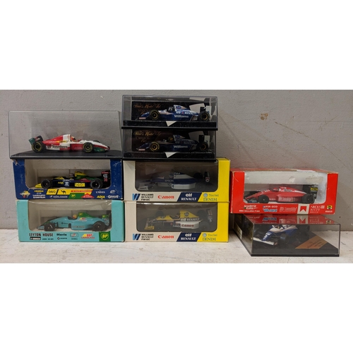 134 - A collection of seven boxed A/F F1 model cars to include Onyx Leyton House, Lamborghini Williams and... 