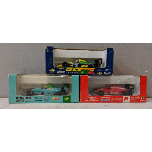 134 - A collection of seven boxed A/F F1 model cars to include Onyx Leyton House, Lamborghini Williams and... 