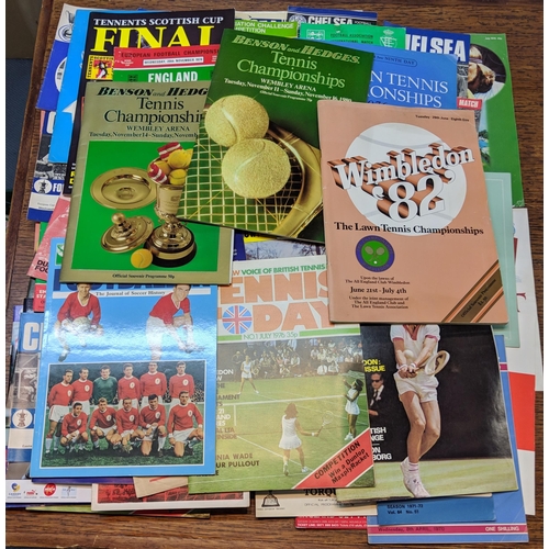 145 - Football, tennis and books relating to other sport and music. An assortment of football programmes f... 