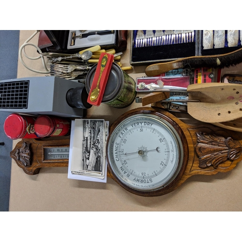 150 - A mixed lot to include; silver plated items, a aneroid barometer, a pair of wooden shoe stretchers a... 