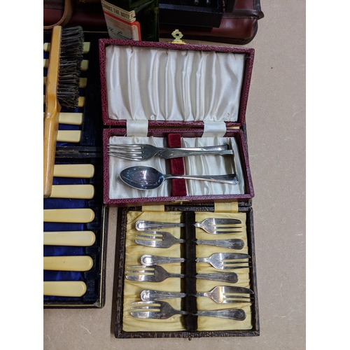 150 - A mixed lot to include; silver plated items, a aneroid barometer, a pair of wooden shoe stretchers a... 