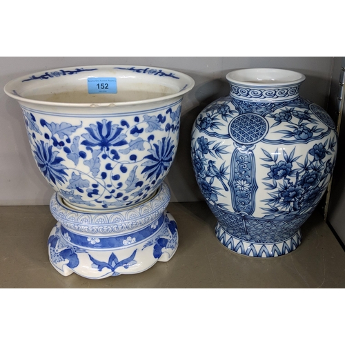 152 - A mixed lot to include a blue and white China plant pot and stand, two small Turkish coffee pots, an... 