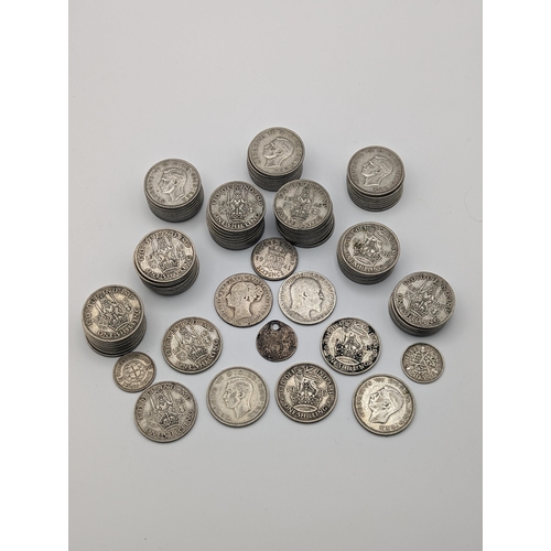 210 - British coins - A collection of pre-1947 George V and George VI shillings, sixpence, and threepence,... 