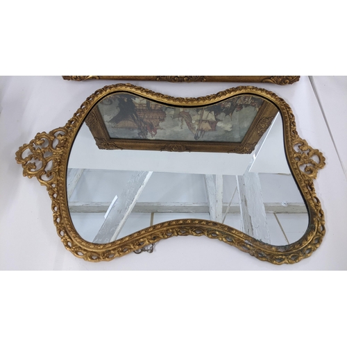 223 - A mid 20th century ornate gilt framed mirror together with a print depicting sailing boats and figur... 