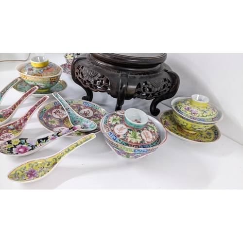 226 - Mixed Oriental items to include a Chinese millefleur tea-bowl and others together with a vase stand
... 