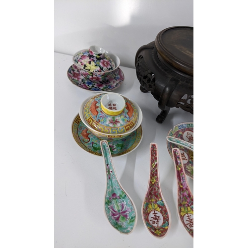 226 - Mixed Oriental items to include a Chinese millefleur tea-bowl and others together with a vase stand
... 