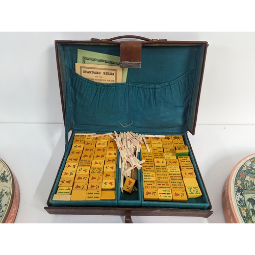 235 - Mixed games to include a cased MahJong set, vintage boxed jigsaw puzzles to include Springbok exampl... 