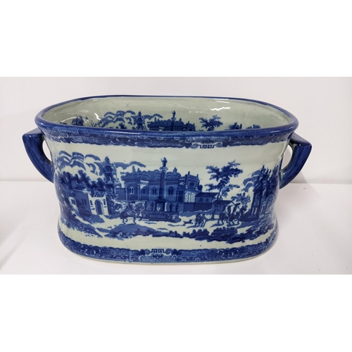 241 - A transfer printed blue and white footbath, Victoria ware Ironbridge mark to the base, 20.5cm h x 46... 