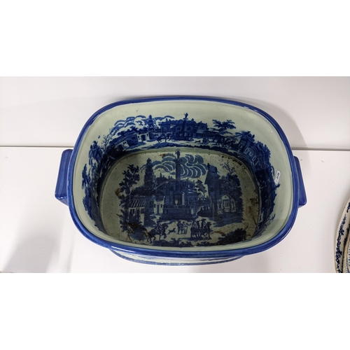 241 - A transfer printed blue and white footbath, Victoria ware Ironbridge mark to the base, 20.5cm h x 46... 