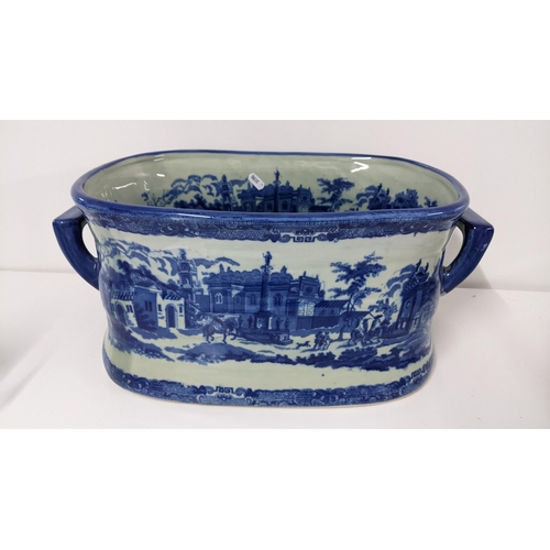 241 - A transfer printed blue and white footbath, Victoria ware Ironbridge mark to the base, 20.5cm h x 46... 