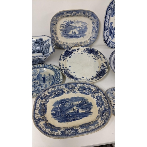 242 - Mixed 19th century blue and white china to include an Ironstone Eton College meat plate and others
L... 