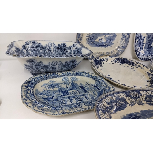 242 - Mixed 19th century blue and white china to include an Ironstone Eton College meat plate and others
L... 