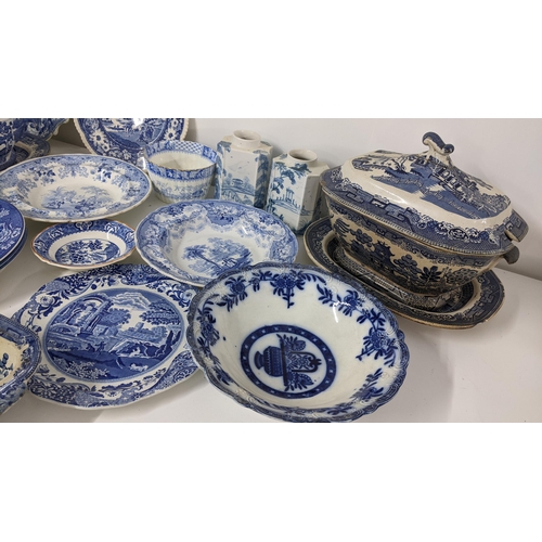 245 - A mixed lot of 19th century and later blue and white to include an Old Willow pattern soup tureen an... 