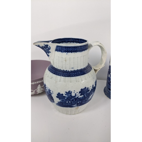 246 - A mixed lot to include a late 18th/early 19th century pearlware blue and white jug, Wedgwood pink Ja... 